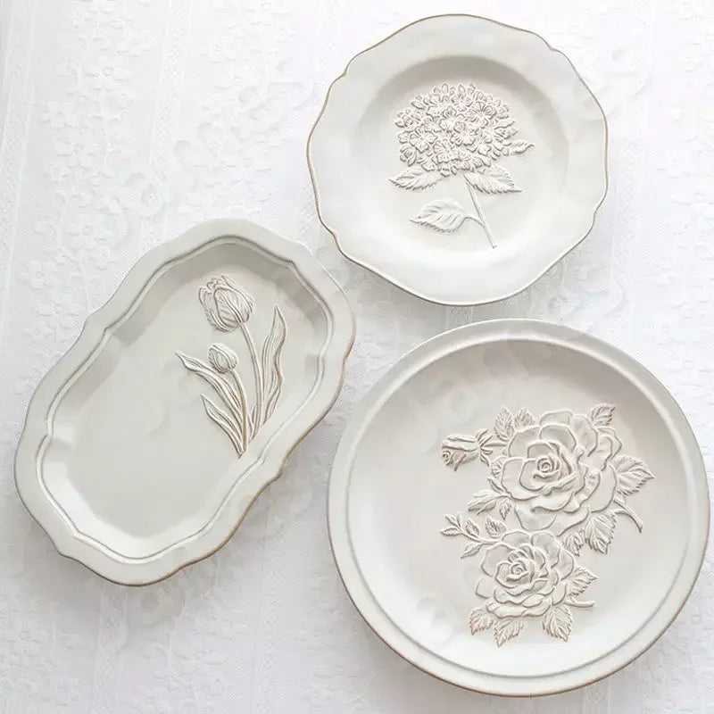 Franske pregete blomsterplater