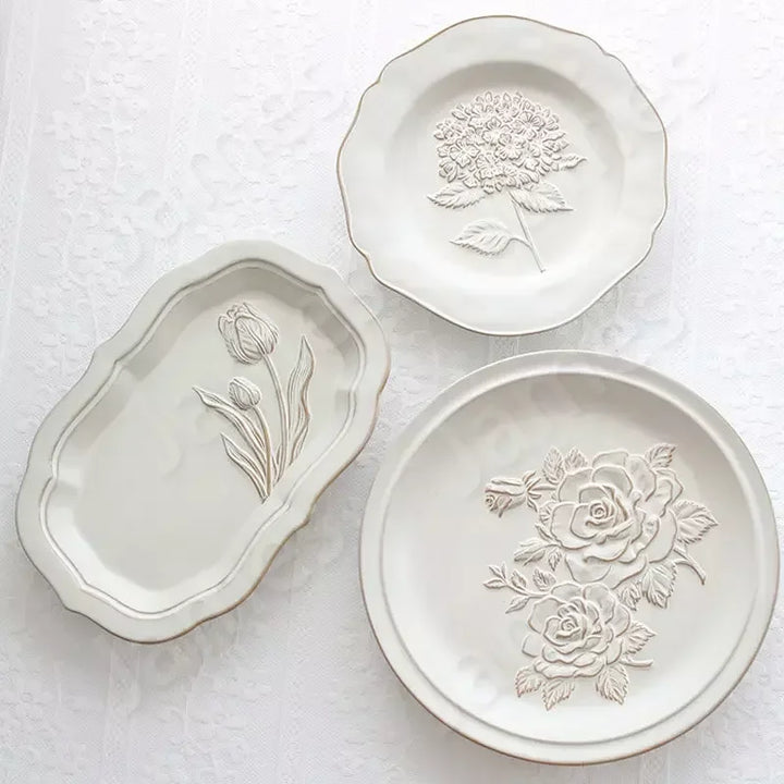 Franske pregete blomsterplater