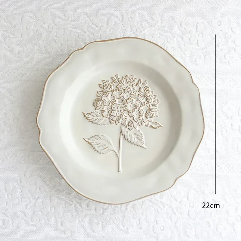 Franske pregete blomsterplater