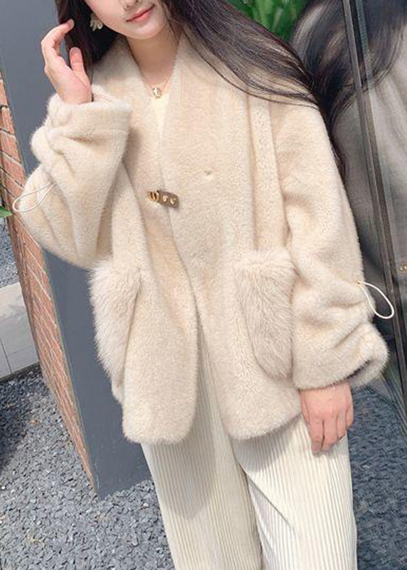 Luvik | Paksut nahkatammapäällysteiset takit punaisella V-aukkolla ja kiristysnyörillä