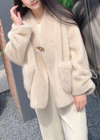 Luvik | Paksut nahkatammapäällysteiset takit punaisella V-aukkolla ja kiristysnyörillä