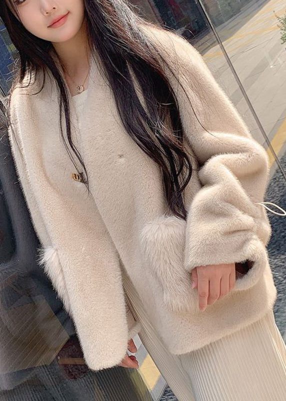 Luvik | Paksut nahkatammapäällysteiset takit punaisella V-aukkolla ja kiristysnyörillä