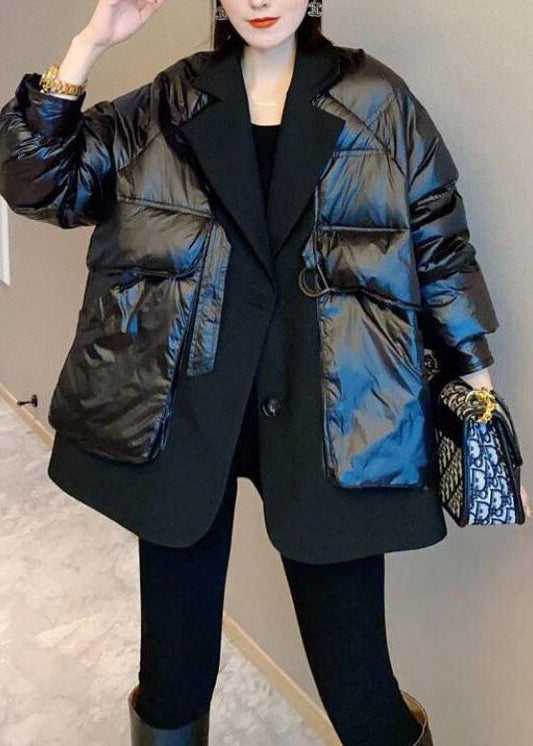 Luvik | Musta untuvaparka, jossa on päällyskangas ja nappikiinnitys