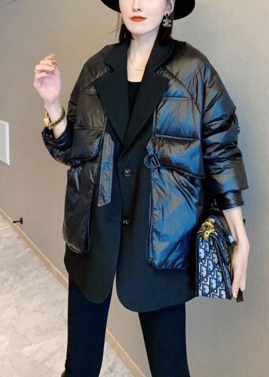 Luvik | Musta untuvaparka, jossa on päällyskangas ja nappikiinnitys