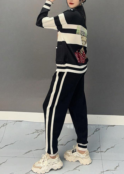 Luvik | Musta puolipaneeli kauluksella oleva patchwork-takki ja leveälahkeiset housut Kaksiosainen asu