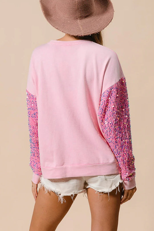Luvik | Julemann Løs Åpen Rund Hals Rosa Ermeløs Sweatshirt