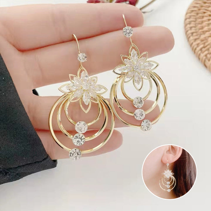 Crystal Lotus Tre Ringer Øredobber Luvikno