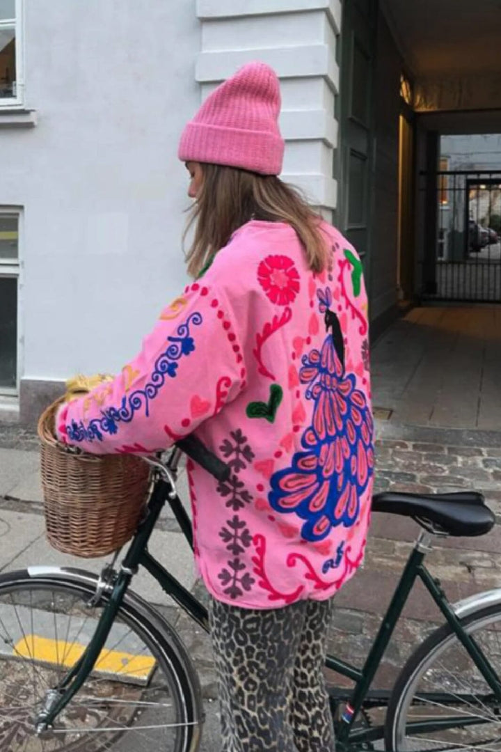 Luvik | Blomstrede trykk på lomme t-skjorte