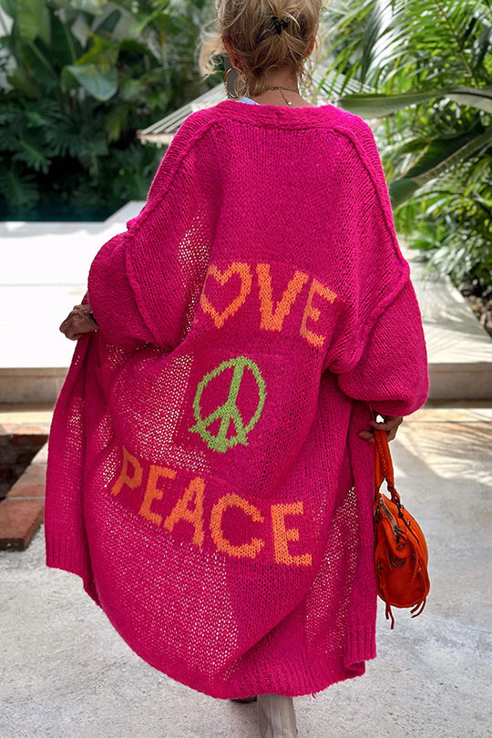 Luvik | Overdimensjonert strikket vest med Love & Peace -motiv
