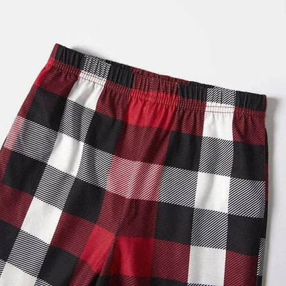 Luvik | Punainen ja harmaa ruudullinen joulupyjama-setti, jossa on lumiukko- ja joulukuusiprintti