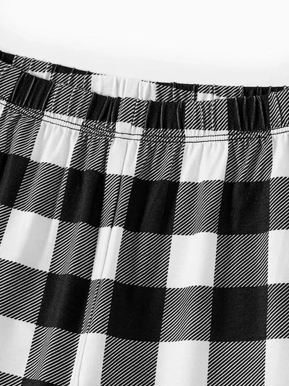 Luvik | "Anna lumisateeseen" teksti ja lumiukko printit musta ja valkoinen ruudullinen perhe pajama