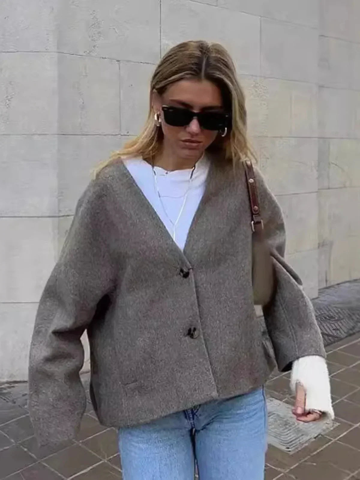 Luvik | Lyhyt nappikiinnitteinen taskujakku