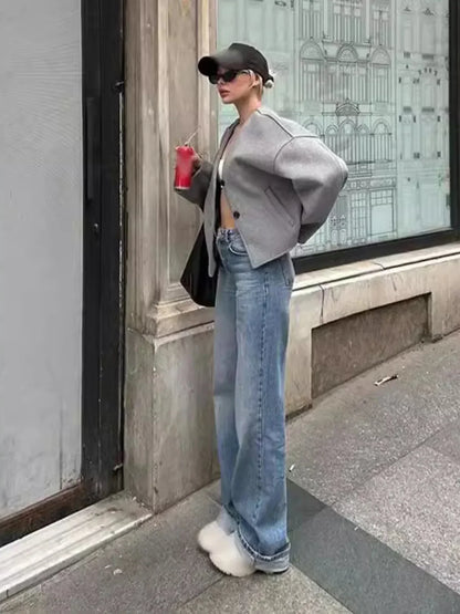 Luvik | Lyhyt nappikiinnitteinen taskujakku