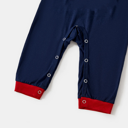 Luvik | "Let It Snow" -slogan ja lumiukko painettu punaisilla ja sinisillä ruudullisilla joulupyrkimyksillä pyjaman yhdistelmä