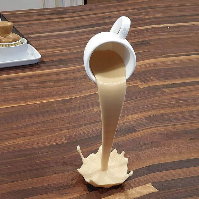 Flytende sølende kaffekopp dekor | Luvikno