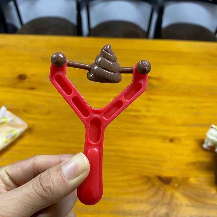 Poo Plunge Slingshot Toy | Luvikno