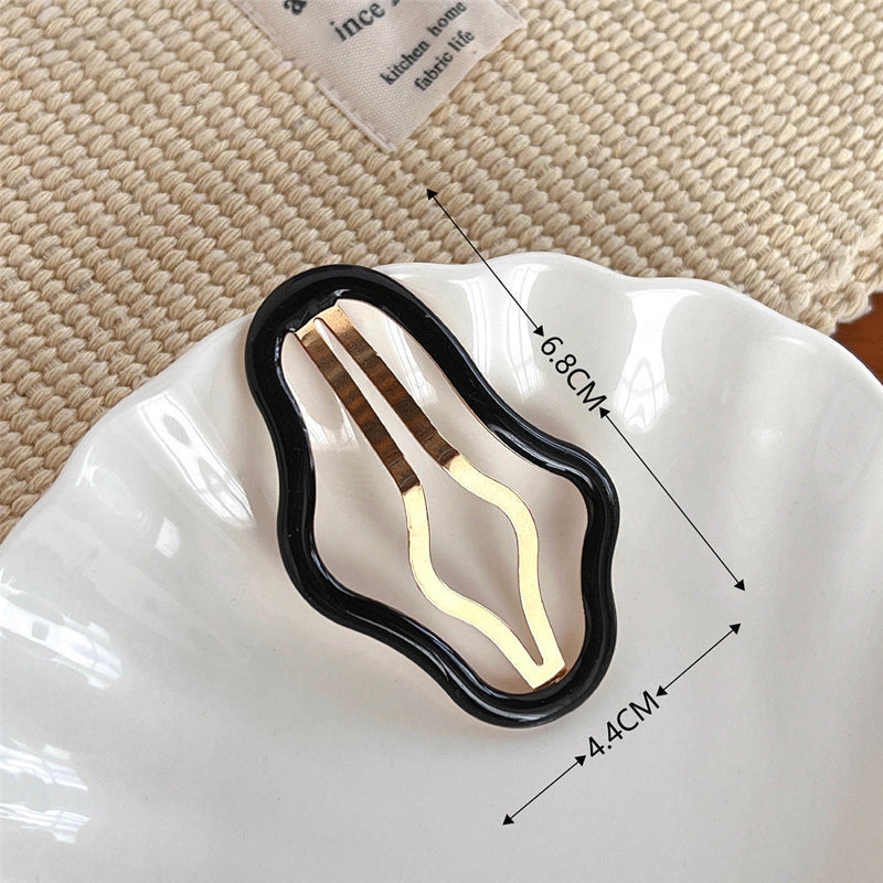 Skyformet hul franjeklipp | Luvikno