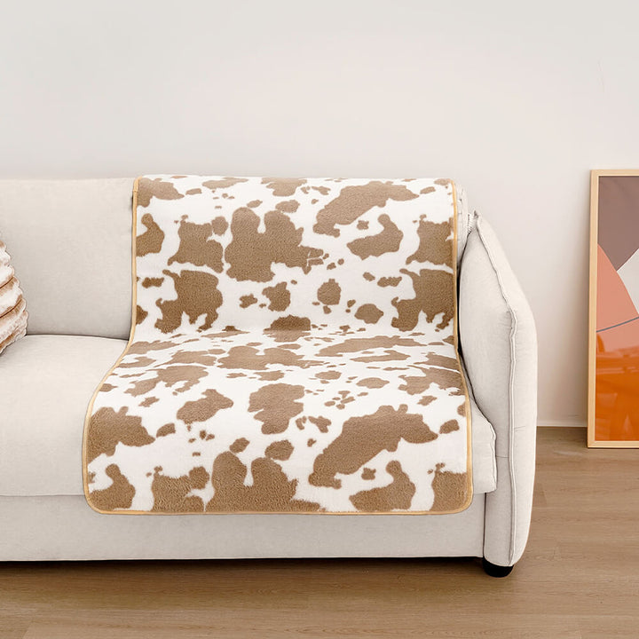 Stilig kjæledyr-teppe med ku-print - CozyCow Luvikno