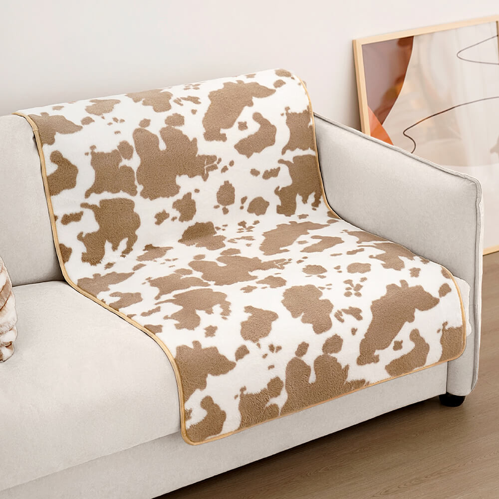Stilig kjæledyr-teppe med ku-print - CozyCow Luvikno